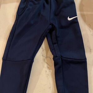 Nike Navy Blue Kids Sweatpants with White Swoosh